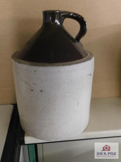 Tan and brown jug(some damage)