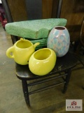 Chair, teapot, and vases