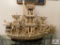 Pierced bone royal boat w/ figurines & guards measures 40