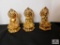 Cast gold-tone statues