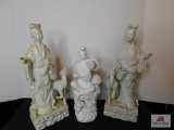 2 Ceramic oriental statutes of ladies w/ dogs