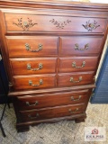 Cherry chest of drawers w/ deep relief carving