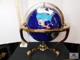 Mother or pearl world globe on brass gold-toned stand w/compass in base