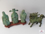 Cast oriental statues