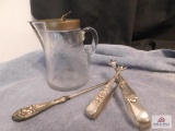 Antique button hook, sugar tongs, syrup server
