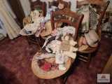 Collection of fancy hats and cloth dolls