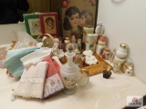 Perfume bottles, towels and pictures