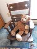 Antique child's oak chair and bear