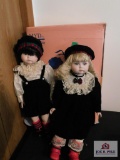 Sister and brother porcelain dolls