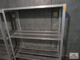 aluminum shelf approx. 20 inches deep, 48 inches long, 60 inches tall