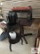 Antique wood table, camel seat bench, metal display stand, and vases