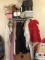 Lot of vintage ladies clothing and hats and metal rack