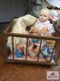 Vintage doll play pen with composition/cloth doll and rubber toys