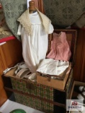 Antique doll trunk with some clothing