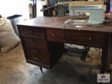 Vintage Futura sewing machine in cabinet