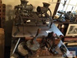 Lot of cast iron items: grinders, cook top, etc.