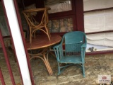 Rattan leg tables, oak chair, and wicker rocker on front porch