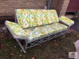 Vintage metal glider with cushions