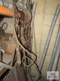 lot of chain binders and pulley (hanging on shelf)