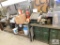 All contents of section of workbench: Electric motors, bench grinders, propane heater, contents of