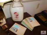 1 gal. Sanitary milk jug and vintage post cards