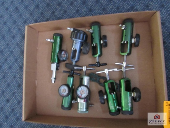 Flat of misc. oxygen tank regulators