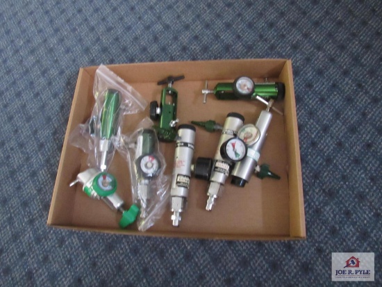 Flat of misc. oxygen tank regulators