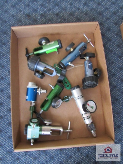 Flat of misc. oxygen tank regulators