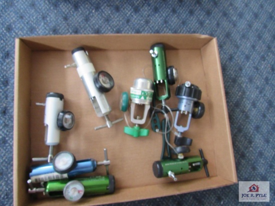 Flat of misc. oxygen tank regulators