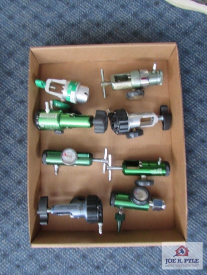 Flat of misc. oxygen tank regulators