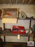 Contents of shelf to include fire extinguisher, easy flares, etc.