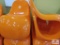 (2) Orange Chairs