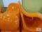 (2) Orange Chairs