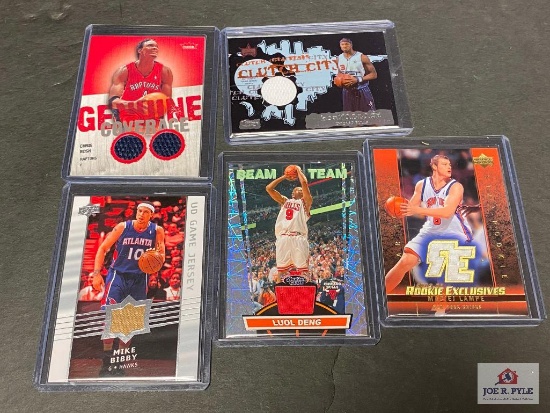 Lot of 5 NBA game worn jersey insert cards.