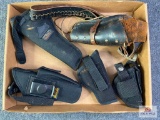 {145} Flat of holsters