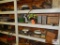 Contents of shelf; PVC fittings, hand saws, etc.