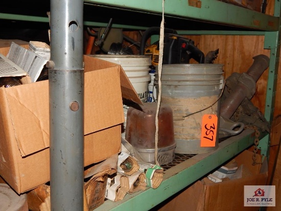 Lot of chain saw parts, light bulbs, beacons?