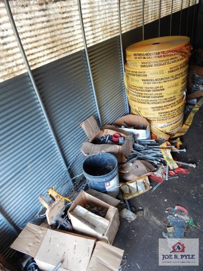 Contents of left side - caution tape & bolts