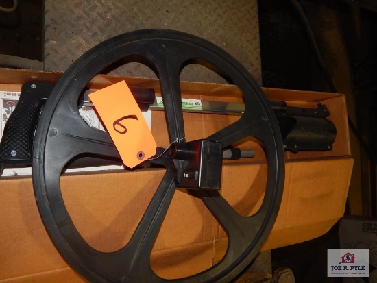 Measuring wheel & paint marking stick