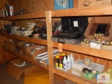 Contents of shelf; electrical tape, computer parts, ash trays, etc.