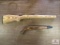 Two wooden stocks: unfinished rifle stock, cracked B-A handgun stock