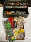 Gun Cleaning supplies: brushes, wads, rods, cleaning kits, green tool box and contents