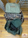 Boyt shooting bag and a Cabela's shooting bag