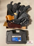 Lot of Holsters, pistol case & cable lock