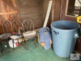 Contents of porch: 3 chairs, Barley House shirts, garbage cans, etc