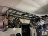 Lot of cook pots hanging from ceiling
