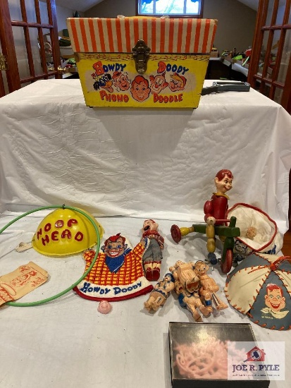 Howdy Doody photograph, wood doll in tricycle, beanie, plastic puppets, etc