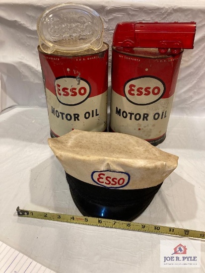 Esso motor oil cans (open), Esso service station attendant cap, and 2 plastic Esso banks