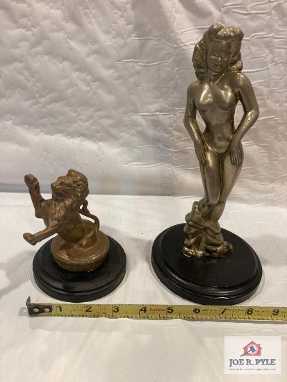 Risqu? lady and lion hood ornaments