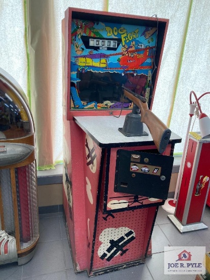 Midway's Dogfight 25 cent skill machine, 69" x 35" x 26", lights up, as found